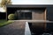 Exterior concept a modern black minimalist stylish house in 3d rendering style Generative AI