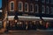Exterior of Cote Brasserie restaurant in Covent Garden, London, UK, on a dark winter evening