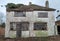 Exterior of derelict house built in 1930`s deco style. House is due for demolition. Rayners Lane, Harrow, UK