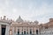 Exterior design of architectures in St Peters Square in the Vatican under cloudy sky