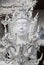 Exterior detail of famous Wat Rong Khun, White Temple in Chiangrai, Chiang Rai Province, Northern Thailand. Statue of the Guard in