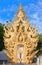 Exterior detail with White Buddha at famous Wat Rong Khun, or White Temple in Chiang Rai Province, Northern Thailand