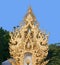 Exterior detail with White Buddha at famous Wat Rong Khun, White Temple in Chiang Rai Province, Thailand