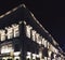 Exterior facade of classic building in the European city at night, architecture and design