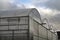 Exterior of a Greenhouse Building on a Cloudy Day