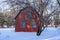 Exterior of the historic Johannes Erickson Log Home, in winter