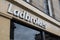 Exterior of Ladbrokes betting gambling shop.  Showing logo, sign, signage and branding of company branches