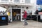 Exterior of The Magpie take away fish and chips showing facade, sign, signage and entrance and customers