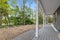 Exterior of a modern ranch house near the forest on a sunny day