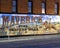 Exterior mural by Western artist Stylle Read, on the side of the building that houses Maverick Fine Western Wear