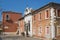 Exterior of the old abandoned building with decaying facade in Murano, Italy.