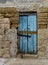Exterior,Old door fragment, old door texture view, abstract scene, nobody at home, weathered door, close door in bright wall