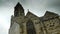 Exterior of an old french church, time lapse