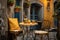 the exterior of an outdoor cafe in the old town, a table and chairs on the street, cozy, decorated with flowers and old