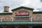 Exterior of a Portillos Hot Dog restaurant, known for their famous Chicago dogs. Close up