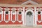 Exterior of the red painted stables building next to Rundale palace in Pilsrundale, Latvia.