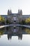 Exterior of the Rijksmuseum reflected in the water, early morning in Amsterdam, Noord-Holland, The Netherlands