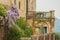 Exterior of San Sebastiano da Po Castle, Torino, Piemonte region, Italy surrounded by nature with beautiful wisteria