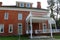 Exterior scene of brick facade of historic Van Horn Mansion, Burt, New York, 2018