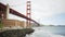 Exterior scene of tourists near Golden Gate bridge at Fort Point