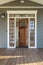 Exterior shot of an open Wooden Front Door