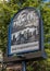 Exterior sign for the Premier public house in Widnes town centre April 2019