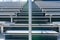 Exterior stadium bleacher stairs with a sun star near the top with clouds.