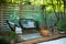 Exterior Terrace with green plants, sofa and lanterns. Cozy space in patio or balcony. Interior Wooden veranda with garden armchai