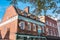 Exterior of traditional brick buildings on a sunny autumn day