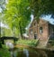 Exterior view of a beautiful church with canal view at Giethoorn