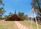 Exterior view of the Bethlehem Lutheran Church with people in Hermannsburg outback Australia