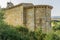 Exterior view of the cloister of the Romanesque Ermita de Santa Eulalia in the neighborhood of Santa MarÃ­a de Aguilar de Campoo,