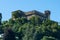 Exterior view of Corbaro Sasso aka Unterwalden or Santa Barbara medieval castle and blue sky in Bellinzona Switzerland