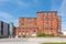 Exterior view of a decayed factory building made of brick