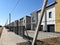 Exterior view of a modern townhouse. The concept of outdoor buildings of multi-apartment residential townhouses