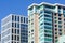 Exterior view of multifamily residential building, next to an office building; South of Market District, San Francisco