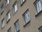Exterior view of an old apartment block in Prora, diagonal view of the rows of windows, Rugen, Germany