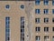 Exterior view of an old apartment block in Prora with many different windows, Rugen, Germany