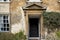 Exterior view of one of the entrances for students and masters at the famous Cambridge University campus