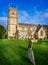 Exterior view of St Michael and All Angels` Church and grave yard in Melksham, Witlshire, UK