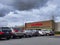 Exterior view of a Value Village thrift shop on a cloudy, overcast day