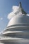 Exterior of the white painted stupa at Isurumuniya rock temple in Anuradhapura, Sri Lanka.