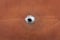 external bullet hole. hole with black center in the iron plate