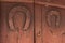 External Detail of Weathered Wooden Doors and keyhole