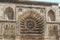 The external facade of the entrance of Al Aqmar mosque in Cairo