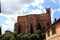 External walls of the monument church of san domenico among the narrow streets of the enchanting medieval siena