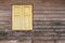 The external wood green window and wall of a vintage wood house.