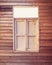 The external wood window and wall of a vintage wood house