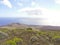 Extinct volcano rim visible above La Restinga village on El Hierro Island Canaries Spain