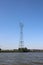 Extra high power tower over river Lek in the Netherlands